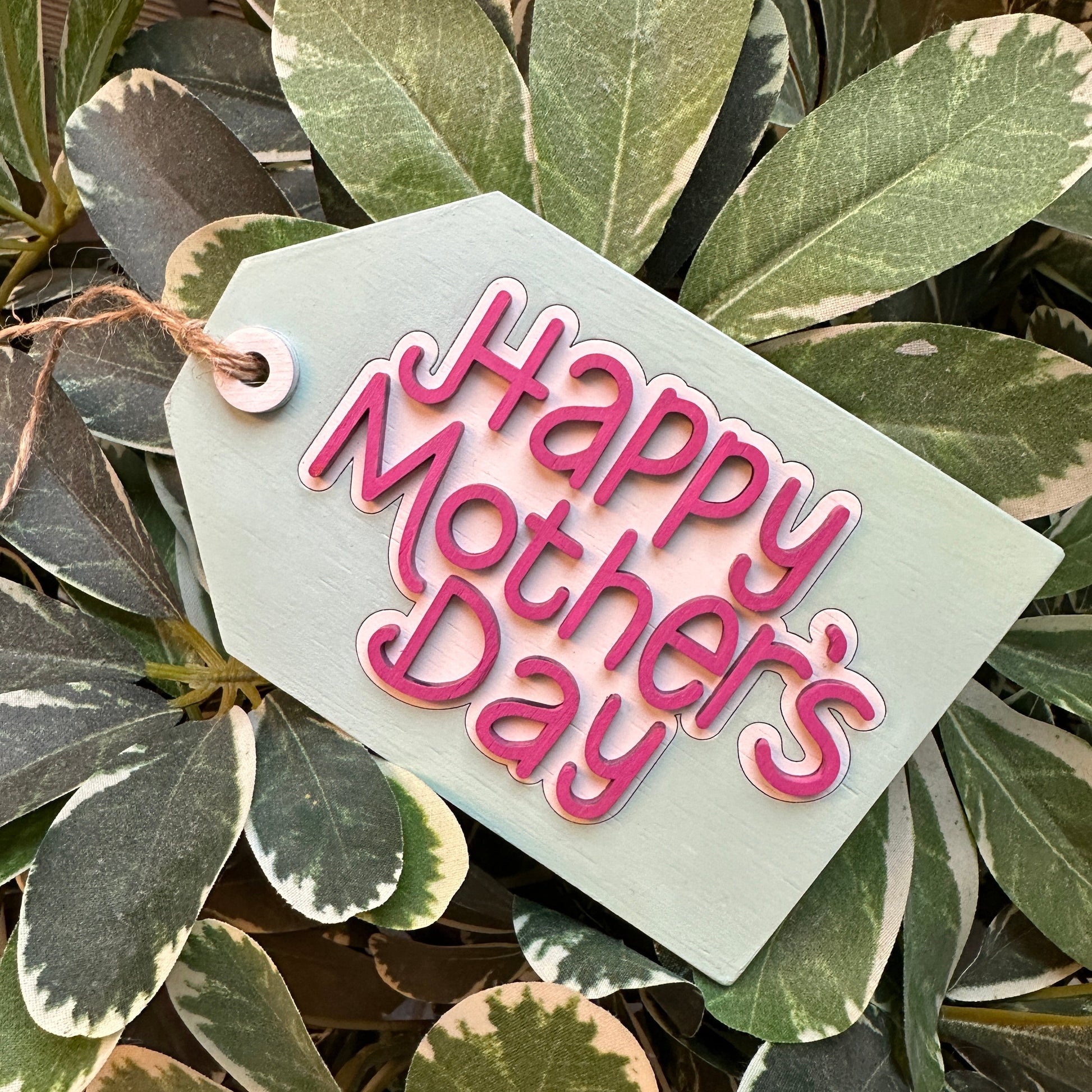 A gift tag that says Happy Mother's Day