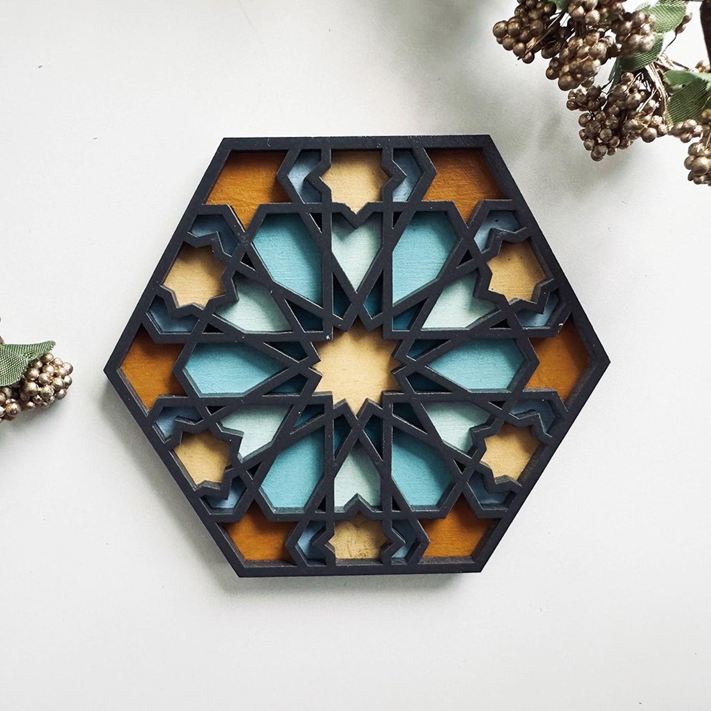 Decorative coaster with geometric pattern on a white background